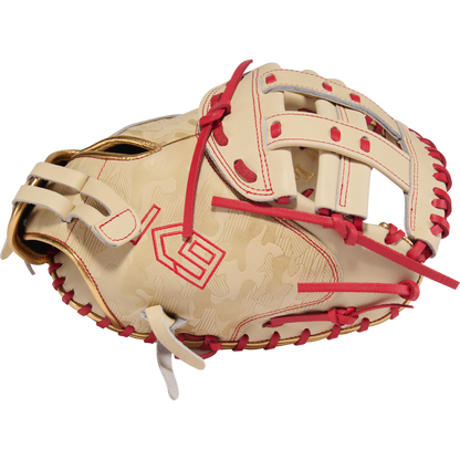 The Rawlings Heart of the Hide 33" Kinzie Hansen K9 Fastpitch Catcher's Mitt (PROCM33FP-24CS) features tan and red leather, red stitching and laces, a bold red logo, and unique patterns inspired by classic catcher's mitts.