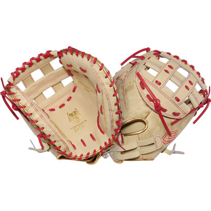 A pair of Rawlings Heart of the Hide 33" Kinzie Hansen K9 Fastpitch Catcher's Mitts (PROCM33FP-24CS) in beige with red laces, gold accents, and woven web pattern are shown open to display both inner and outer sides.