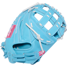 The Rawlings Heart of the Hide 34" Fastpitch Catcher's Mitt (PROCM34FP-24CBW) features a light blue design with white laces and stitching, webbed pocket, and the Rawlings logo—a top-tier catcher’s mitt for softball players.