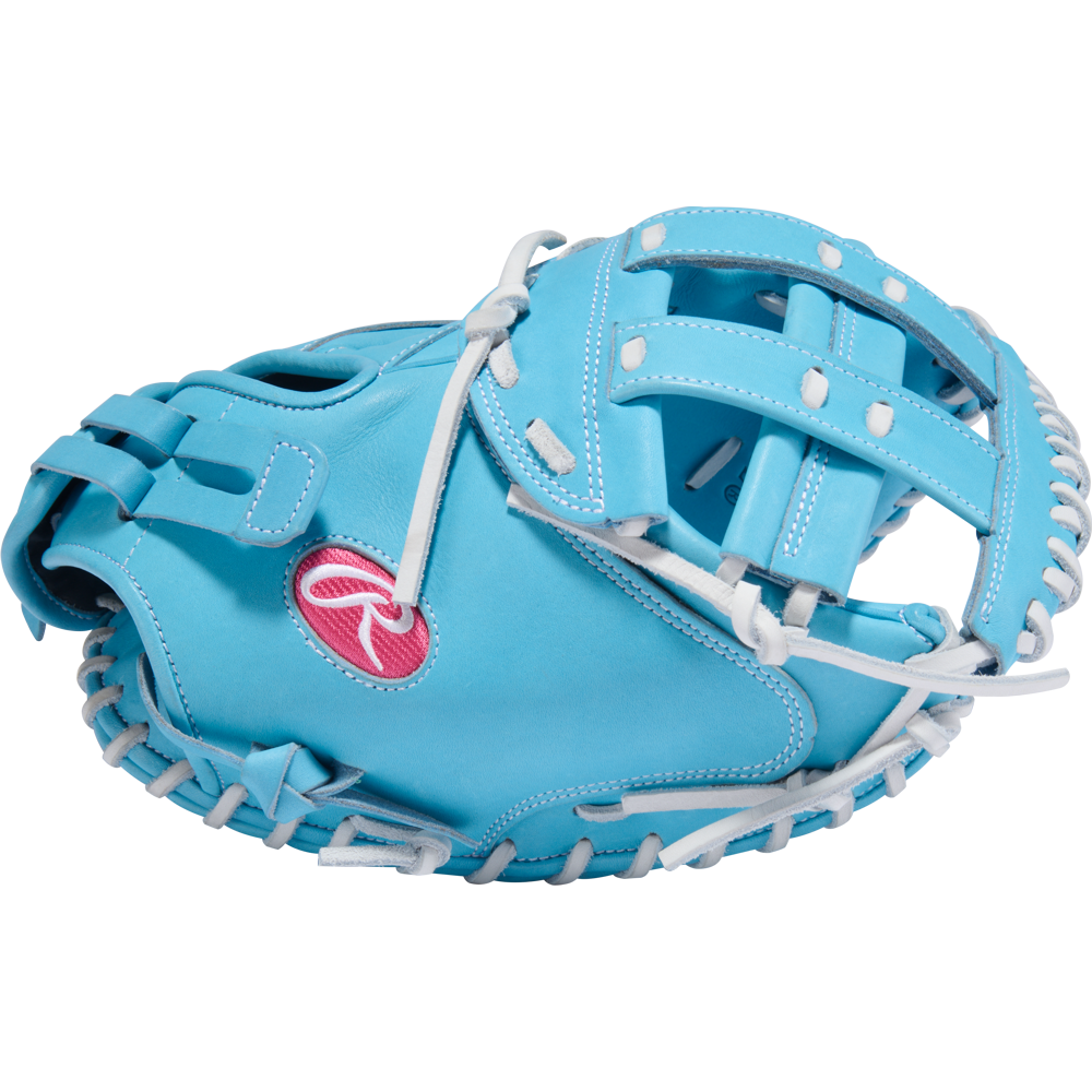 The Rawlings Heart of the Hide 34" Fastpitch Catcher's Mitt (PROCM34FP-24CBW) features light blue leather, white laces, and a pink and white Rawlings logo, displayed on a plain white background.