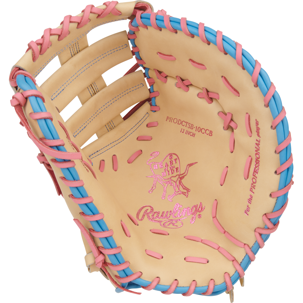 The Rawlings Heart of the Hide 13" Fastpitch First Base Mitt (PRODCTSB-10CCB) features a tan design with blue and pink laces, plus "The Heart of the Hide" and "For the PROFESSIONAL PLAYER" in pink—ideal for fastpitch softball.