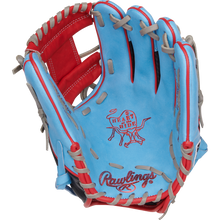 The Rawlings Heart of the Hide 11.5" Baseball Glove (PROR204-2CBS) is blue with red and gray lacing, features the iconic logo on the palm, and displays detailed interior stitching.