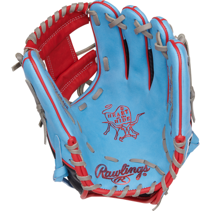 The Rawlings Heart of the Hide 11.5" Baseball Glove (PROR204-2CBS) is blue with red and gray lacing, features the iconic logo on the palm, and displays detailed interior stitching.