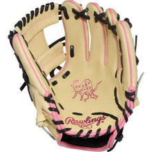 A Rawlings Heart of the Hide 11.5" Baseball Glove (PROR204-2CPB) with tan leather, black laces, and pink accents is shown open on a white background, featuring iconic Rawlings branding on the palm.