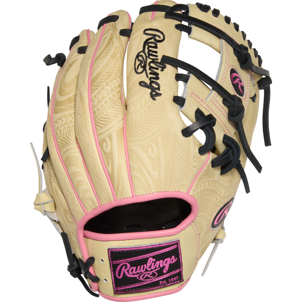 The Rawlings Heart of the Hide 11.5" Baseball Glove (PROR204-2CPB) features a beige design with pink and black accents, detailed engravings, and bold Rawlings branding on the back and wrist strap.