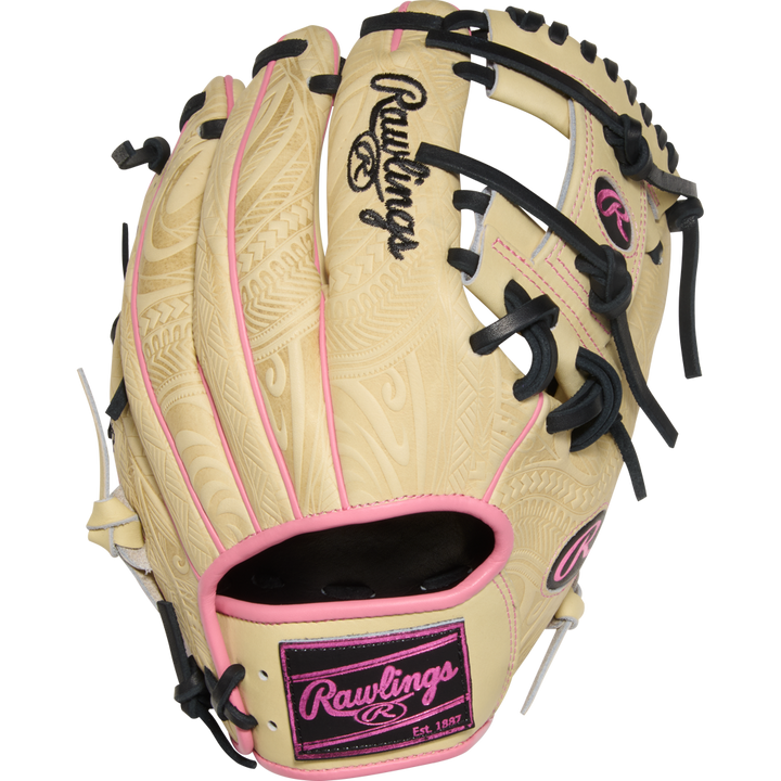 The Rawlings Heart of the Hide 11.5" Baseball Glove (PROR204-2CPB) features a beige design with pink and black accents, detailed engravings, and bold Rawlings branding on the back and wrist strap.