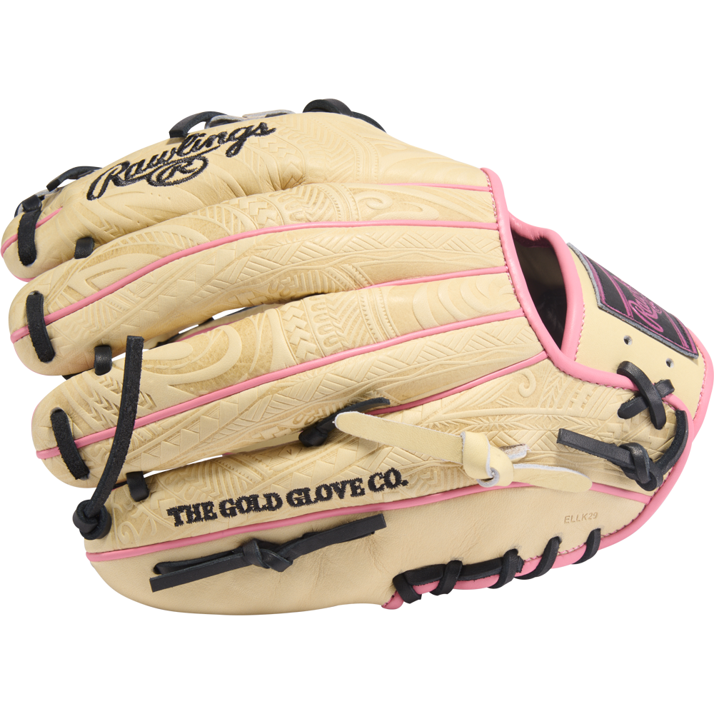 The Rawlings Heart of the Hide 11.5" Baseball Glove (PROR204-2CPB) features a tan design with black laces, pink accents, engraved patterns, and "THE GOLD GLOVE CO." printed in black on the thumb.