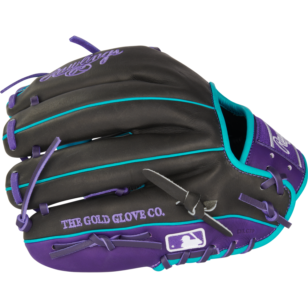 The Rawlings Heart of the Hide 11.5" Baseball Glove (PROR204-2DSTP) is black with purple laces, teal accents, a stitched purple Rawlings logo, and features THE GOLD GLOVE CO. and MLB logos on the thumb area.