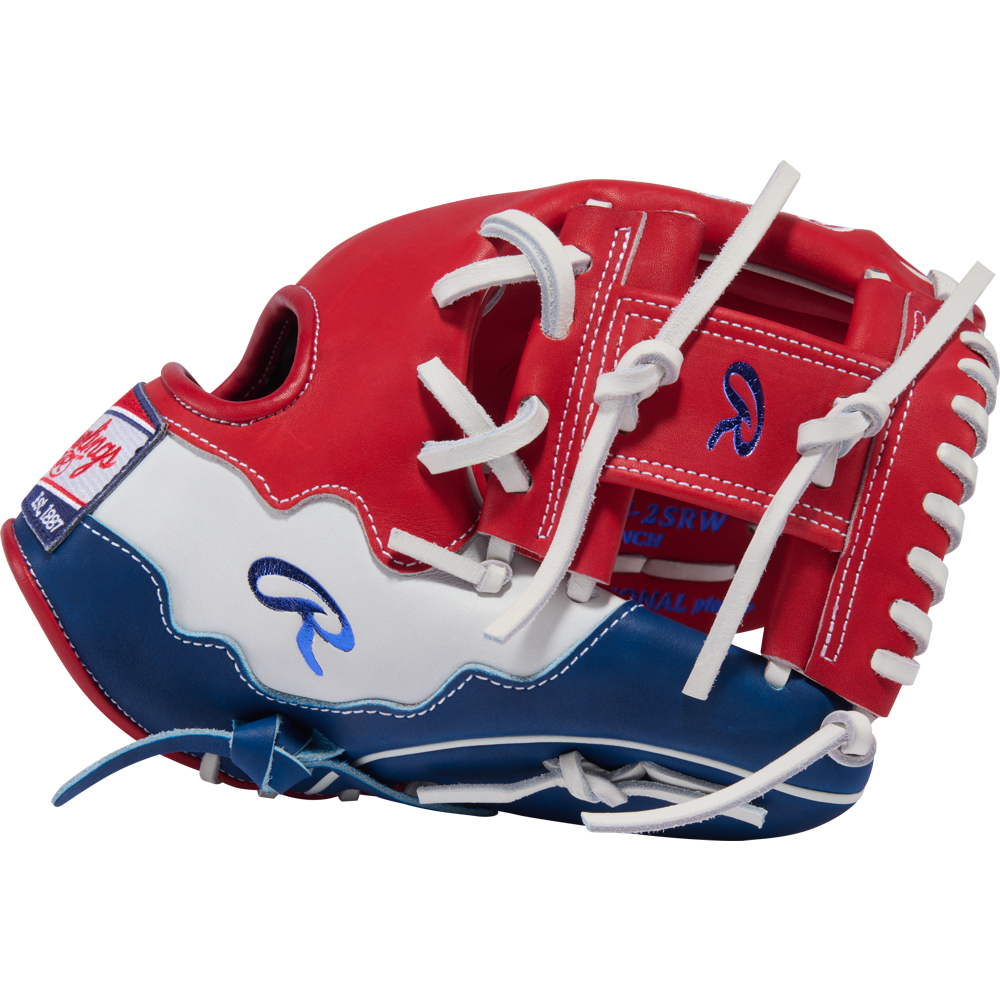 The Rawlings Heart of the Hide 11.5" Baseball Glove (PROR204-2SRW) features a red, white, and blue design with white laces and logos on the side and wrist strap, displayed against a plain white background.