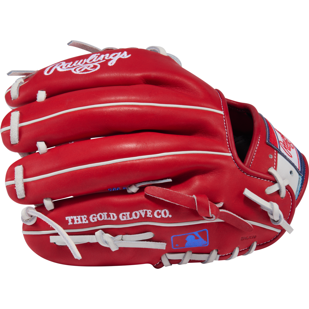 The Rawlings Heart of the Hide 11.5" Baseball Glove (PROR204-2SRW) in red with white laces features the Rawlings logo, "THE GOLD GLOVE CO." on the side, a blue MLB logo by the wrist, and is ideal for infield play.
