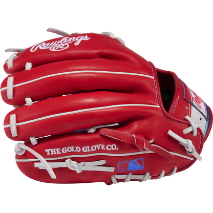 The Rawlings Heart of the Hide 11.5" Baseball Glove (PROR204-2SRW) in red with white laces features the Rawlings logo, "THE GOLD GLOVE CO." on the side, a blue MLB logo by the wrist, and is ideal for infield play.