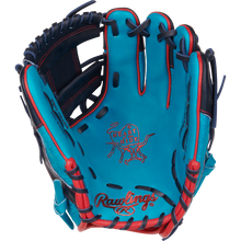 The Rawlings Heart of the Hide 11.5" Color Sync Baseball Glove (PROR204-2TE) features turquoise and navy leather, red stitching, black laces, and the iconic Heart of the Hide logo embossed on the palm—an exclusive from Rawlings.