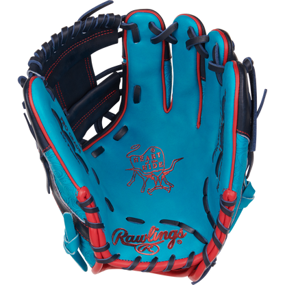 The Rawlings Heart of the Hide 11.5" Color Sync Baseball Glove (PROR204-2TE) features turquoise and navy leather, red stitching, black laces, and the iconic Heart of the Hide logo embossed on the palm—an exclusive from Rawlings.