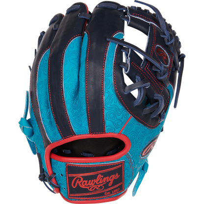 The Rawlings Heart of the Hide 11.5" Color Sync Baseball Glove (PROR204-2TE) features turquoise and navy leather with red trim, swirl patterns, and dark laces, displayed on a white background.