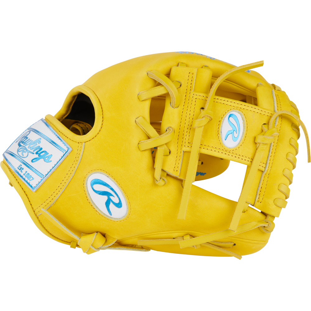 The Rawlings Heart of the Hide 11.5" Color Sync Baseball Glove (PROR204-2Y) features a bright yellow design with blue and white Rawlings logos, visible laces, and an open web, displayed on a plain white background.