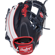 The Rawlings Heart of the Hide ContoUR 11.5" Baseball Glove (PROR204U-2N) showcases a navy blue and white design with red accents, complete with the Rawlings logo and Est. 1887 on the wrist strap.