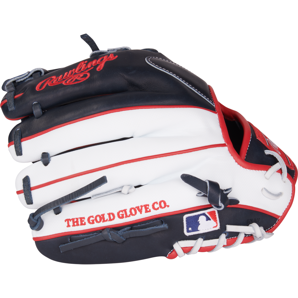 The Rawlings Heart of the Hide ContoUR 11.5" Baseball Glove (PROR204U-2N) features navy, white, and red colors, THE GOLD GLOVE CO. and MLB logos, plus advanced ContoUR Fit for superior comfort and infield performance.