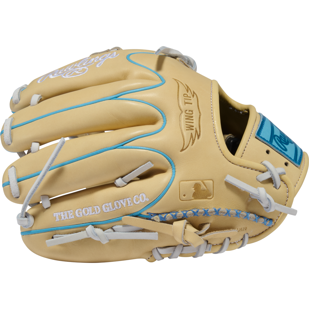 A new Rawlings Heart of the Hide 11.5″ Baseball Glove (Model PROR204W-1CCB) is shown from the top, featuring a tan design with blue stitching, silver laces, and “THE GOLD GLOVE CO.” text on the side.