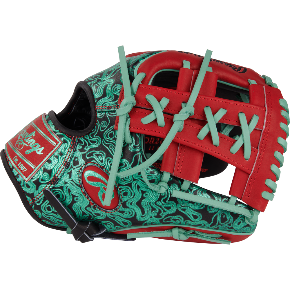 The Rawlings Heart of the Hide 11.5" Color Sync Glove (PROR204W-32BS) features a black base, swirling green patterns, red laces and web, plus light blue and red accents. Rawlings branding appears on the side of this bold glove design.