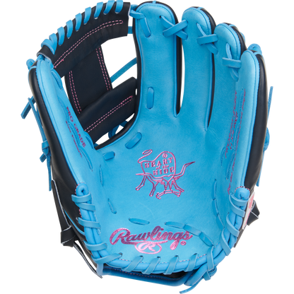 The Rawlings Heart of the Hide 11.75" Baseball Glove (PROR205-2CBN) features bright blue leather, black and pink accents with pink stitching, and Rawlings branding—an ideal infield glove for standout style and performance.