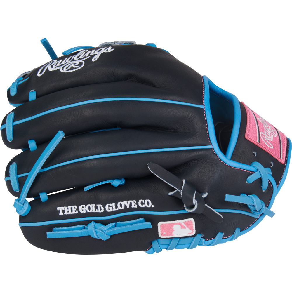 A Rawlings Heart of the Hide 11.75" Baseball Glove (PROR205-2CBN) in black with blue laces, pink accents, THE GOLD GLOVE CO. text, and MLB logo is shown on a white background.