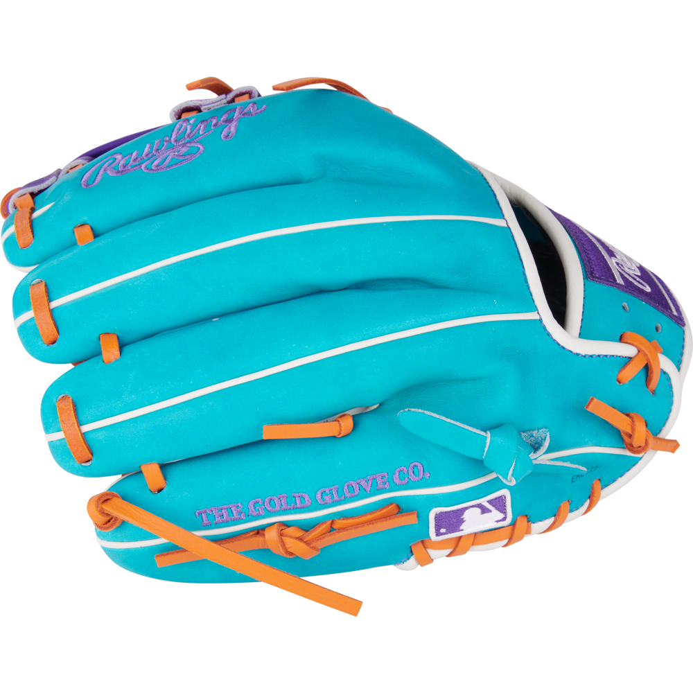 The Rawlings Heart of the Hide 11.75" Baseball Glove (PROR205-32TEP) features turquoise leather, orange laces, white piping, purple branding, The Gold Glove Co., and an MLB logo on the side.