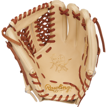 The Rawlings Heart of the Hide 11.75" Baseball Glove (PROR205-4CTG) is a tan infield glove with brown laces, Heart of the Hide logo, and a bull graphic embossed on the palm.