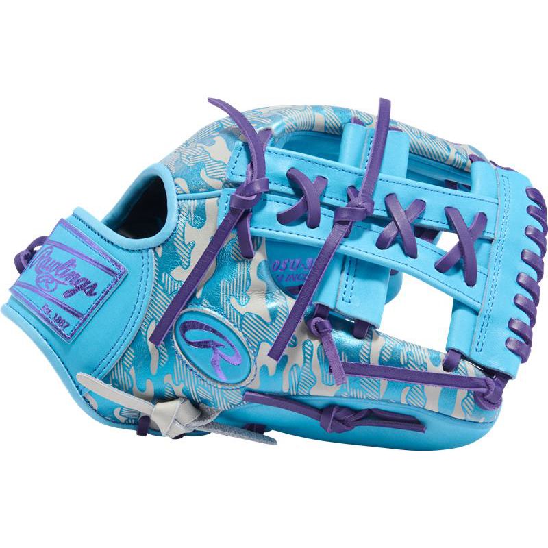 A Rawlings Heart of the Hide 11.75" Baseball Glove (PROR205U-32CBG) in light blue and purple with white camo pattern and purple laces, displayed on a plain white background.