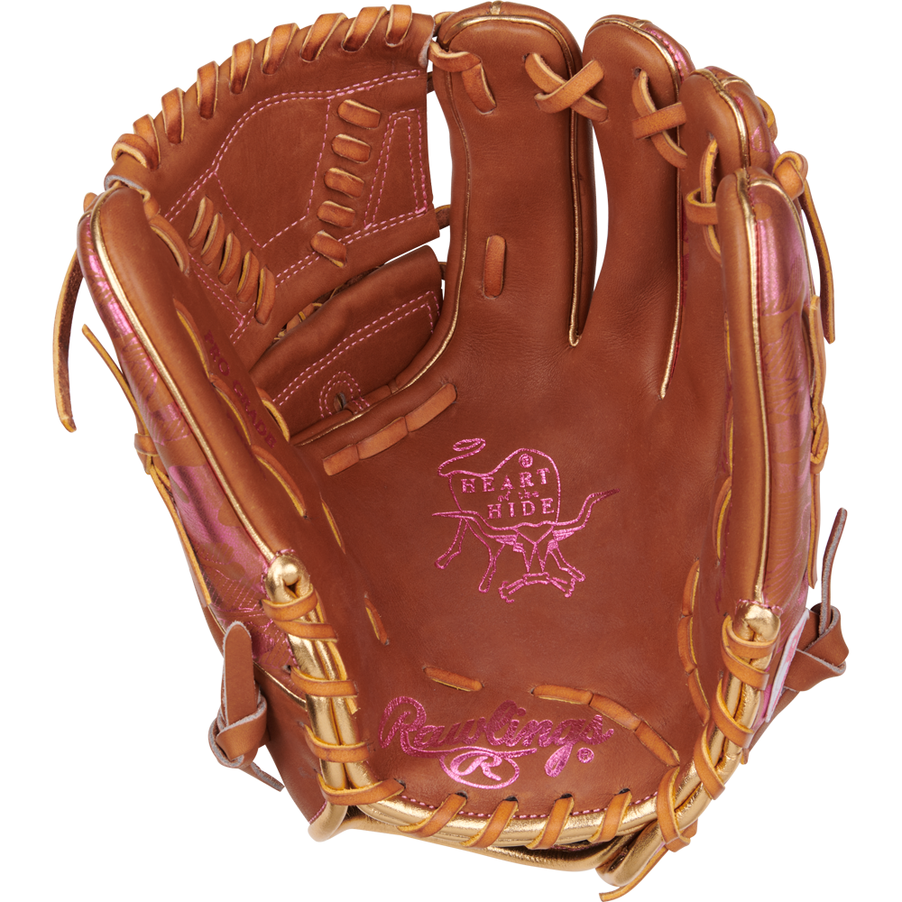 A Rawlings Heart of the Hide 11.75" Color Sync Baseball Glove (PROR205W-30GB) in brown with pink stitching and laces, shown open with visible branding on the palm and thumb.