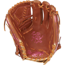 A Rawlings Heart of the Hide 11.75" Color Sync Baseball Glove (PROR205W-30GB) in brown with pink stitching and laces, shown open with visible branding on the palm and thumb.