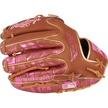The Rawlings Heart of the Hide 11.75" Color Sync glove (PROR205W-30GB) features brown leather, pink camo accents and stitching, ColorSync details, "The Gold Glove Co." text, and an MLB logo near the wrist.