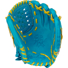 The Rawlings Heart of the Hide 12" Color Sync Baseball Glove (PROR206CFB-11TE) is a bright blue pitcher’s glove with yellow laces, basket web design, detailed stitching, and the Heart of the Hide logo stamped on the palm.