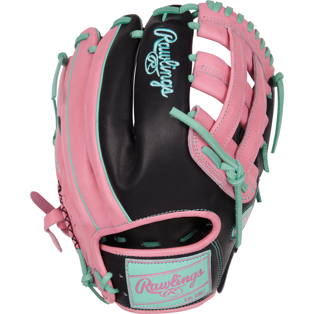 The Rawlings Heart of the Hide 12.25" Color Sync Baseball Glove (PROR207-6BP) features a black base with pink and teal accents, teal laces, a pink Rawlings logo, open webbing, and is designed for outfielders.
