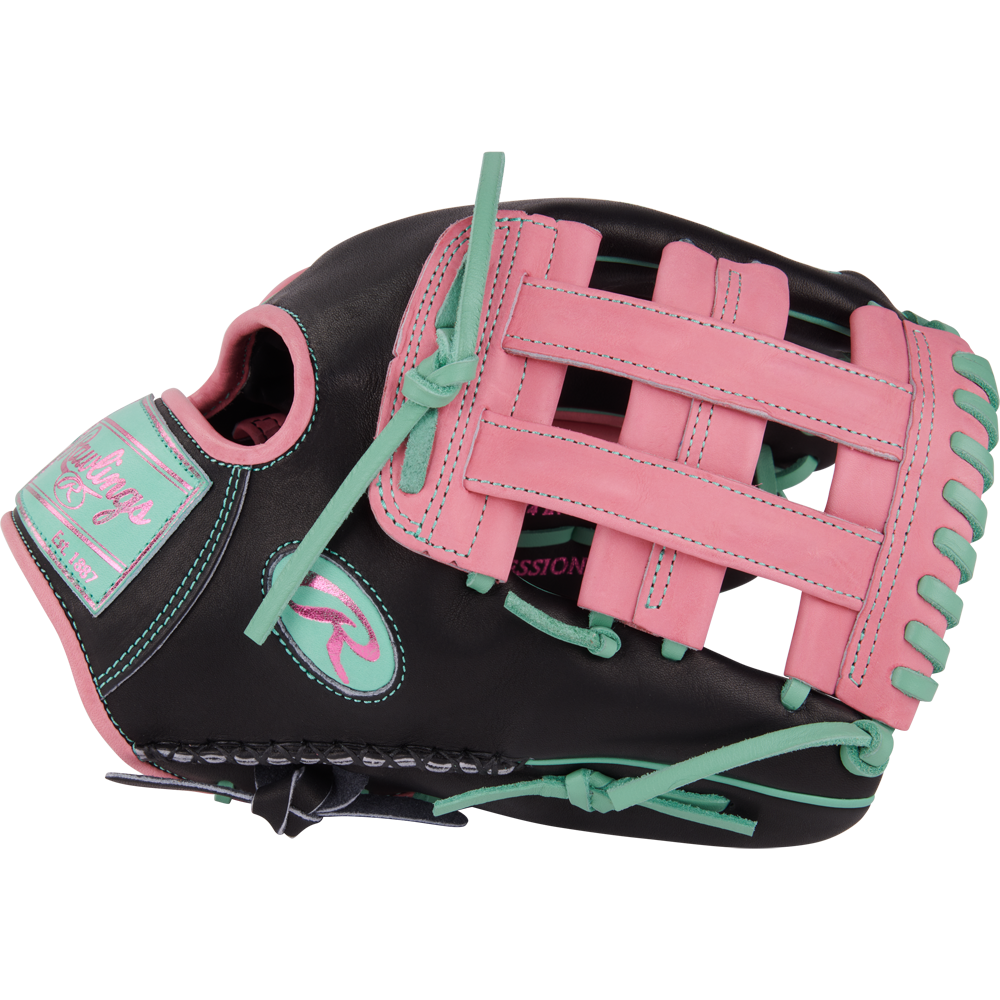 The Rawlings Heart of the Hide 12.25" Color Sync Baseball Glove (PROR207-6BP) features a black design with pink and teal laces, stitching, and accents, plus a pink patch, teal webbing highlights, and bold branding details.