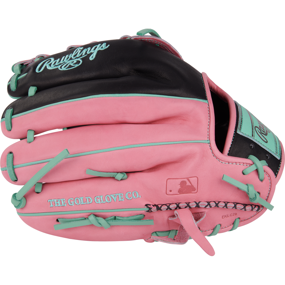 The Rawlings Heart of the Hide 12.25" Color Sync Baseball Glove (PROR207-6BP) features a pink and black design with teal laces and accents, Rawlings logo, THE GOLD GLOVE CO. text, and a small MLB logo.