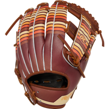 A Rawlings Heart of the Hide 11.75" Baseball Glove (PROR2175-13TI), featuring a brown design with orange, red, and yellow striped accents on the fingers and thumb, is displayed against a white background.