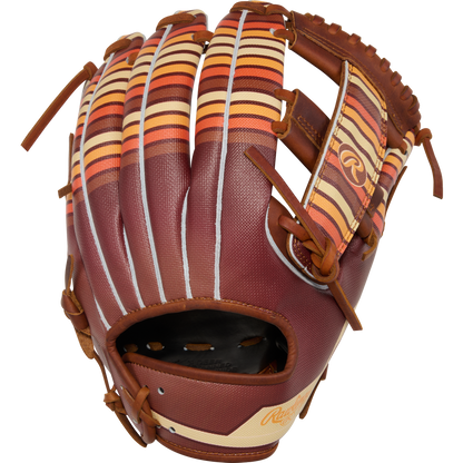 A Rawlings Heart of the Hide 11.75" Baseball Glove (PROR2175-13TI), featuring a brown design with orange, red, and yellow striped accents on the fingers and thumb, is displayed against a white background.