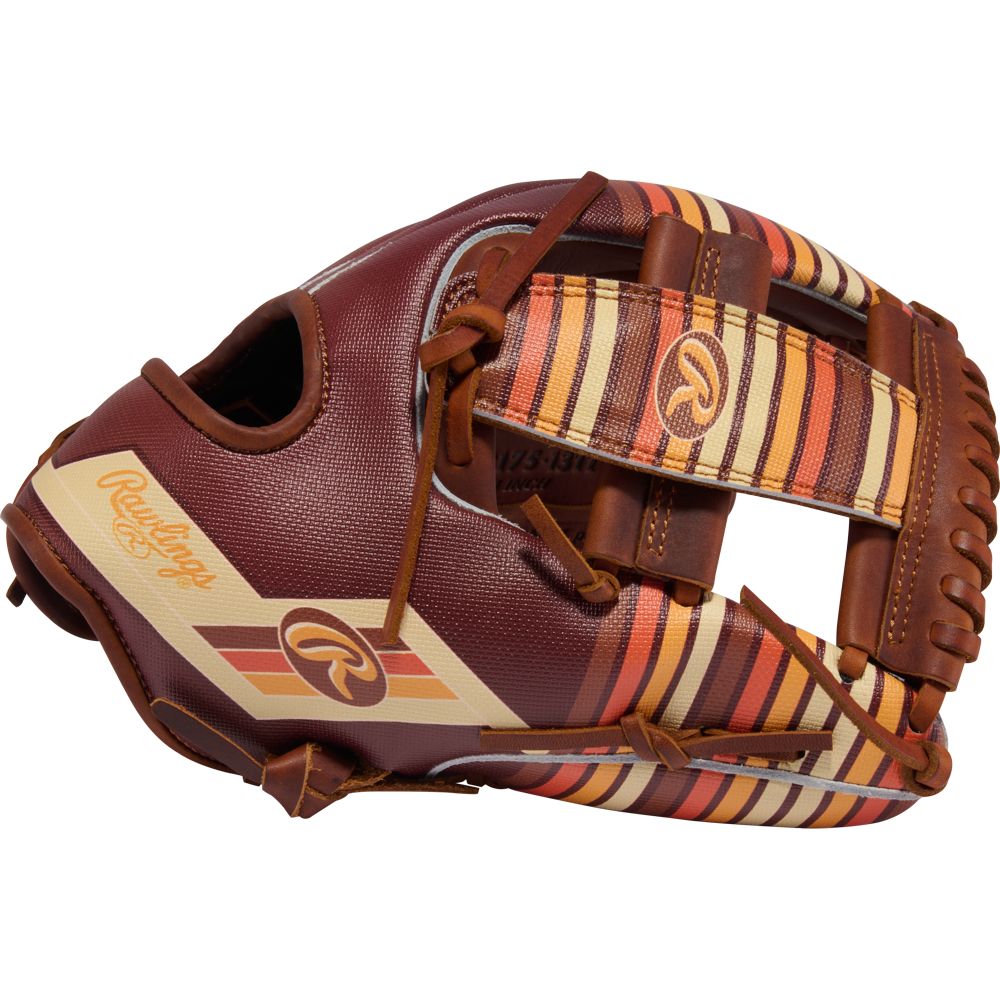 The Rawlings Heart of the Hide 11.75" Baseball Glove (PROR2175-13TI) features a brown design with tan, yellow, and orange striped accents on the webbing and thumb, plus visible Rawlings logos on the thumb and wrist strap.