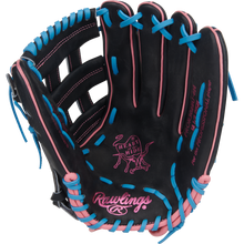 The Rawlings Heart of the Hide 12.5" Baseball Glove (PROR3028U-6N) is a black outfield glove with pink and blue laces, ContoUR fit design, and the Heart of the Hide logo on the palm.