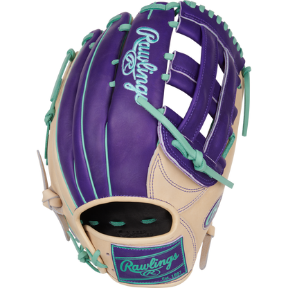The Rawlings Heart of the Hide 12.75" Color Sync Baseball Glove (PROR3039-6CPU) features tan leather with purple and teal accents, visible stitching and lacing, plus the Rawlings logo embroidered in teal on the back.