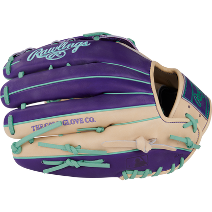 The Rawlings Heart of the Hide 12.75" Color Sync Baseball Glove (PROR3039-6CPU) features purple and tan leather, teal laces, teal accents, and striking teal "Rawlings" and "THE GOLD GLOVE CO." stitching.