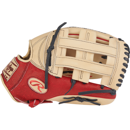 The Rawlings Heart of the Hide 12.75" Baseball Glove (PROR3039-6CS) features a tan and red design, black laces, a woven web, embossed red palm, and a logo patch on the wrist.