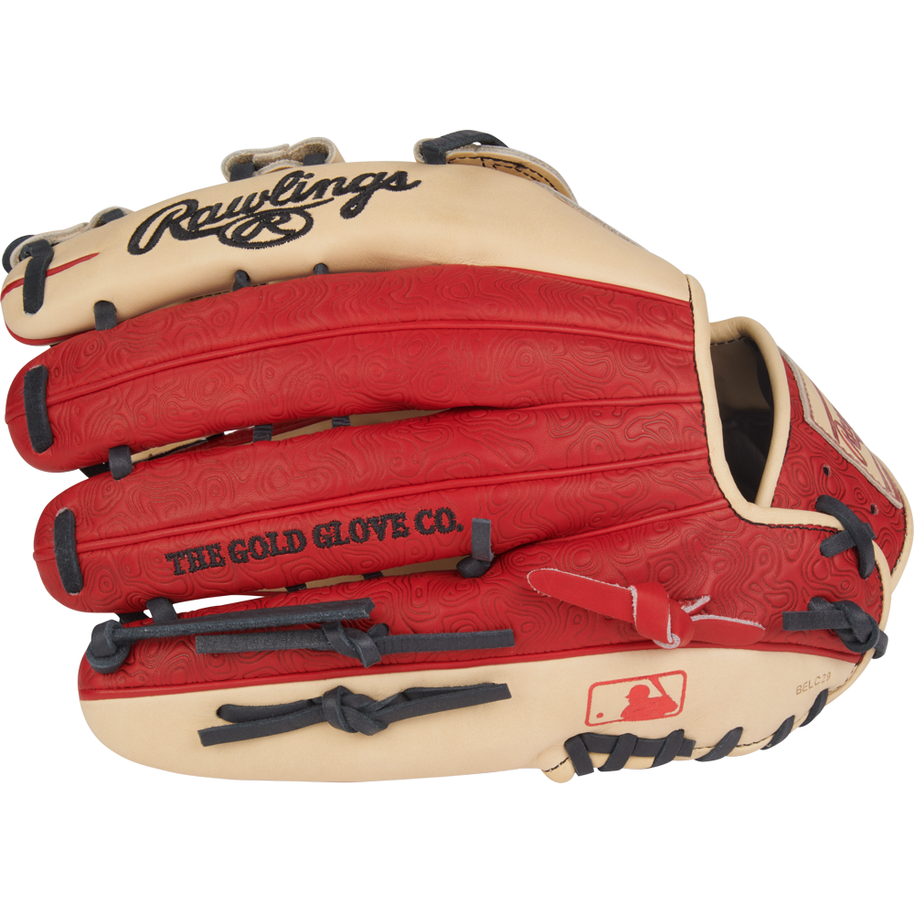 The Rawlings Heart of the Hide 12.75" PROR3039-6CS outfield glove features a red and tan design with black laces, "THE GOLD GLOVE CO." text, and the MLB logo on the thumb area.