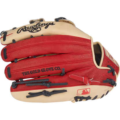 The Rawlings Heart of the Hide 12.75" PROR3039-6CS outfield glove features a red and tan design with black laces, "THE GOLD GLOVE CO." text, and the MLB logo on the thumb area.