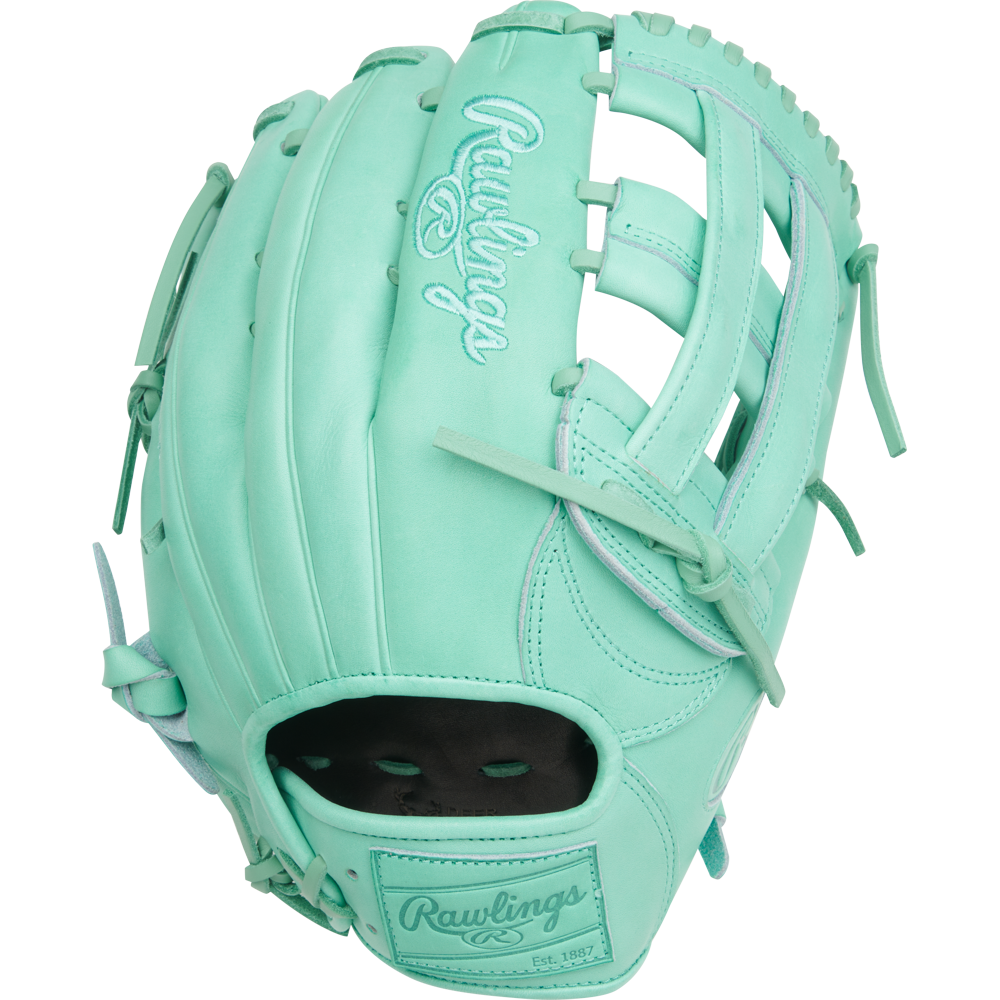 The Rawlings Heart of the Hide 12.75" Baseball Glove (PROR3039-6M) features a mint green design with light blue stitching and laced webbing, shown against a plain white background.