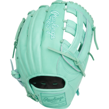 The Rawlings Heart of the Hide 12.75" Baseball Glove (PROR3039-6M) features a mint green design with light blue stitching and laced webbing, shown against a plain white background.