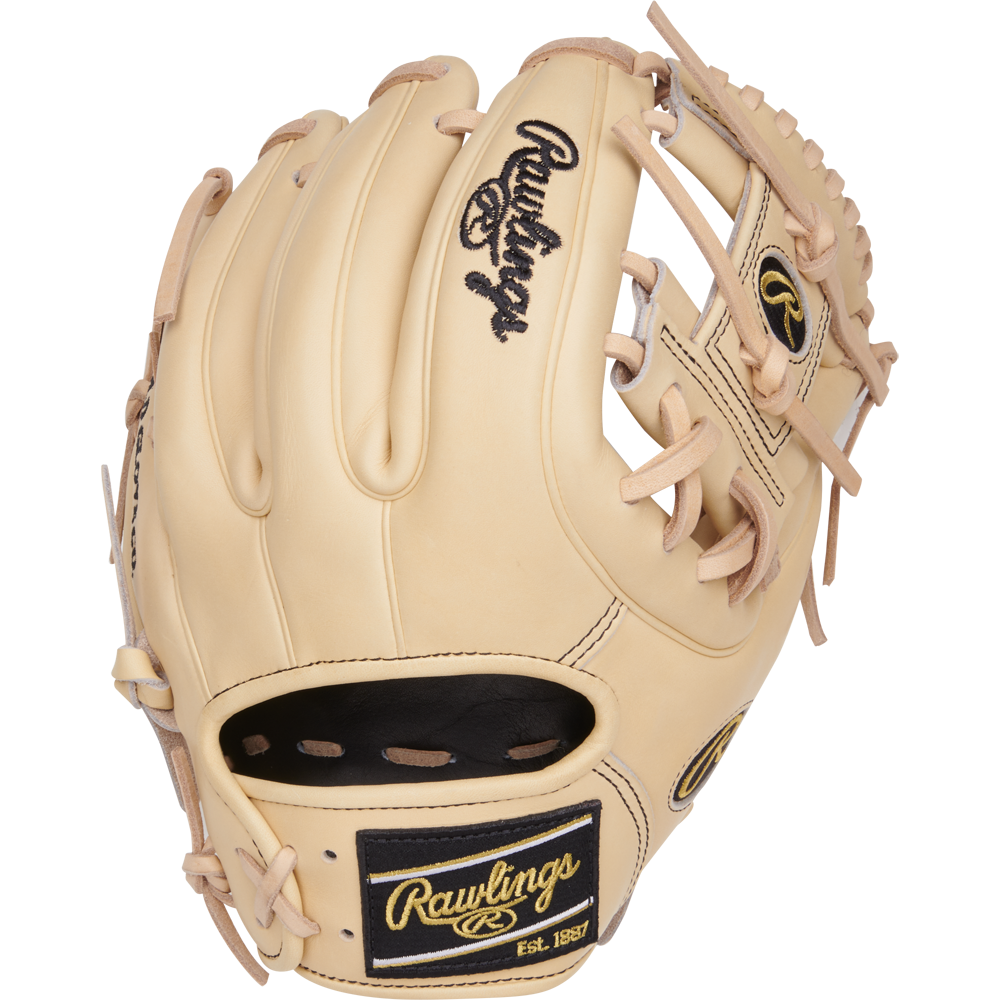 A Rawlings Heart of the Hide 11.25" Baseball Glove (PROR312-2CB) featuring a tan finish, Pro-I web, black/gold Rawlings logos, detailed stitching, and leather laces is displayed against a plain light background.