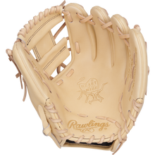 The Rawlings Heart of the Hide 11.25" Baseball Glove (PROR312-2CB) is a tan leather infield glove with a Pro-I web, visible stitching, and the iconic Heart of the Hide logo embossed on the palm.