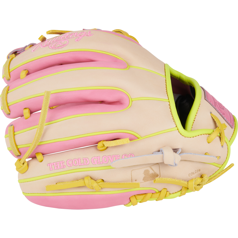 The Rawlings Heart of the Hide 11.25" Color Sync Baseball Glove (PROR312U-2P) features a tan design with pink and yellow accents, "THE GOLD GLOVE CO." embossing, and detailed stitching.