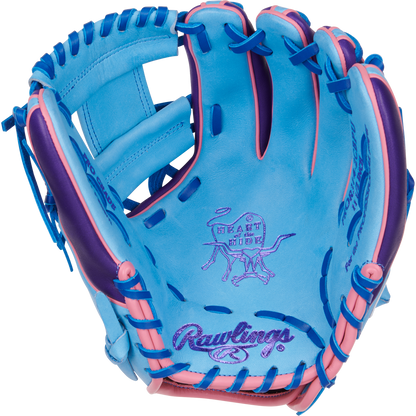 The Rawlings Heart of the Hide 11.5" Color Sync Baseball Glove (PROR314-2CBPU) features blue and pink leather, purple "HEART OF THE HIDE" stitching, an illustrated steer logo on the palm, blue laces, and pink accents on the fingers.